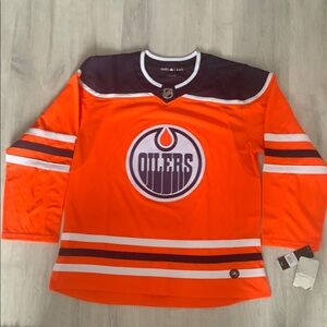 Edmonton Oilers Brand new Adidas Climalite Orange and Dark Blue NHL Jersey